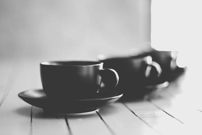 Close-up of coffee cup on table