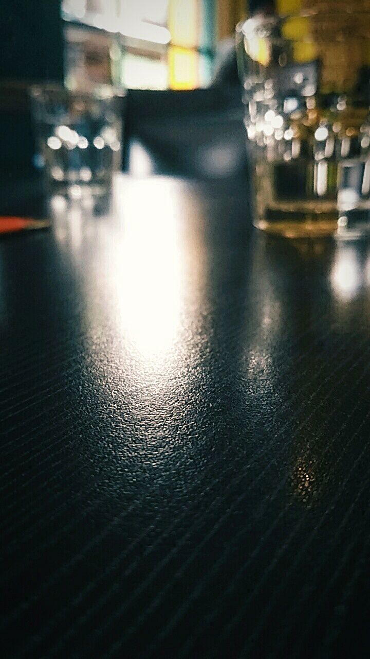 CLOSE-UP OF DRINK ON TABLE