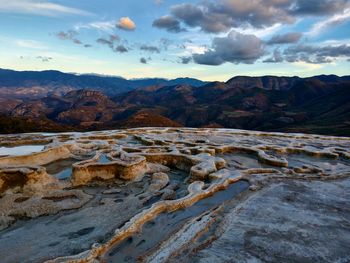 Scenic view of mountains against sky during sunset