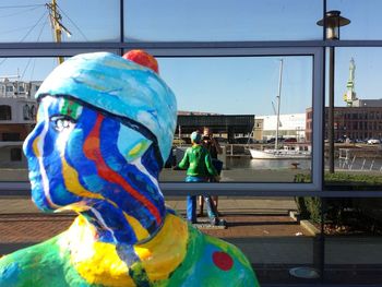 Panoramic shot of statue on street in city