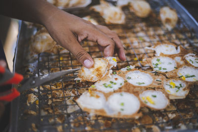 Midsection of person preparing food