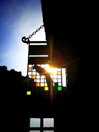 Silhouette of building at sunset