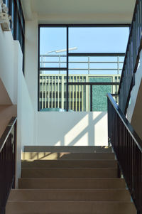 Low angle view of staircase in building against sky