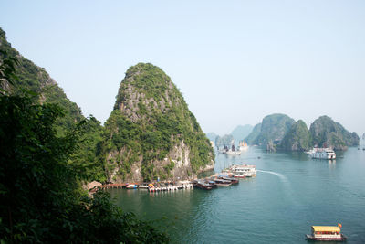 Beautiful aerial view of halong bay. touristic boats, sunny day, calm water.