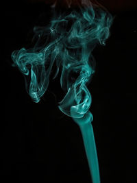 Close-up of smoke against black background