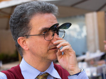 Close-up of thoughtful mature man wearing eyeglass