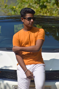 Portrait of young man wearing sunglasses
