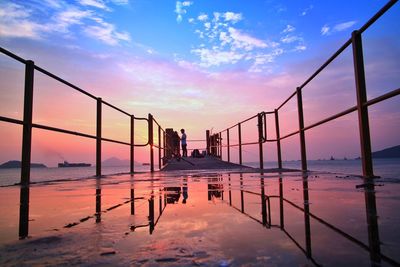 Scenic view of sea against sky at sunset