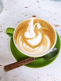 Close-up of cappuccino on table