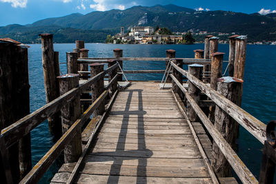 View of jetty leading to sea