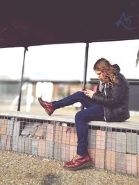 Woman playing with umbrella