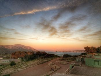 Scenic view of calm sea at sunset