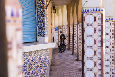 Motorcycle parked in corridor