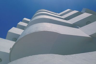 Low angle view of built structure against blue sky