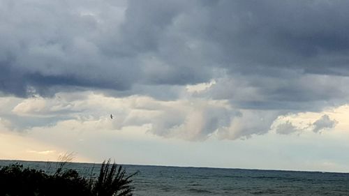 View of sea against cloudy sky