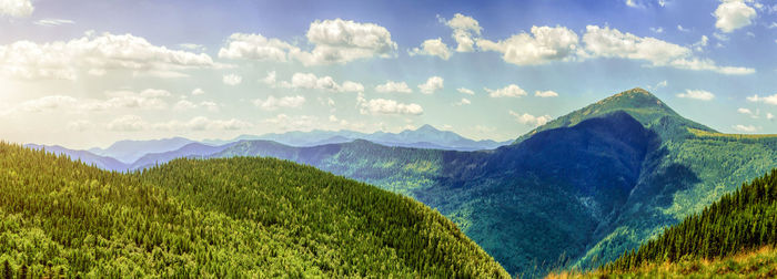 Panoramic view of landscape and mountains against sky