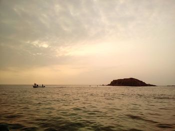 Scenic view of sea at sunset