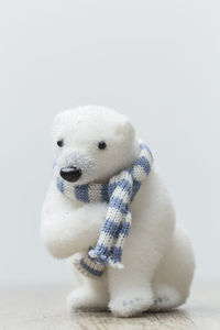 Close-up of stuffed toy over white background