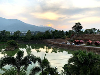 Scenic view of lake against sky during sunset