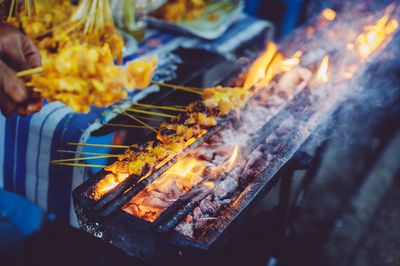 Close-up of meat on barbecue grill