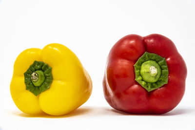 Close-up of bell peppers against white background