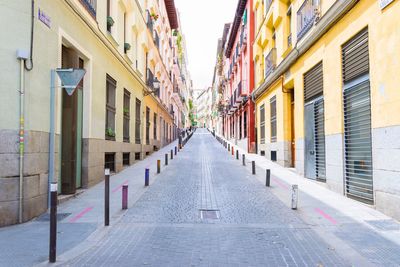 Alley amidst residential buildings