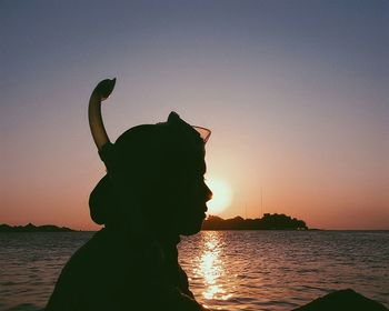 Scenic view of sea at sunset