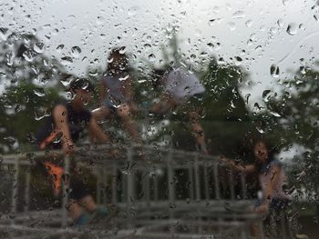 Rain drops on water