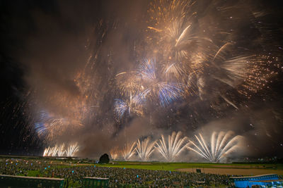 Firework display at night