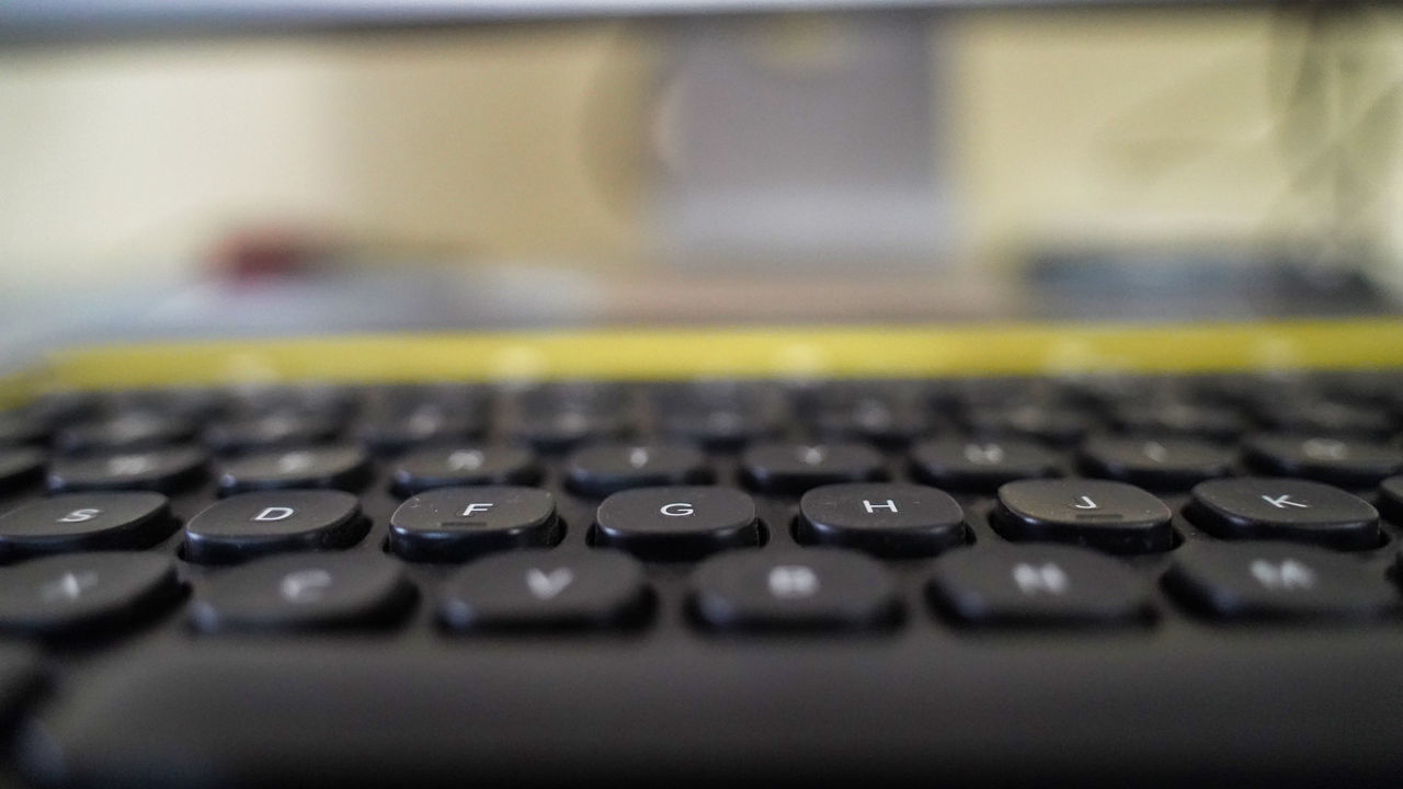 CLOSE-UP OF LAPTOP ON TABLE