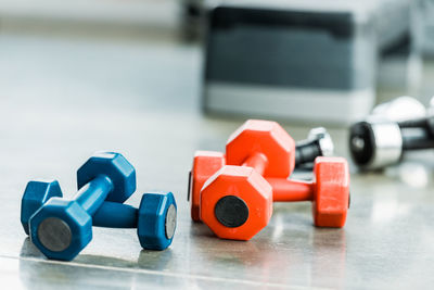 Close-up of dumbbells on table