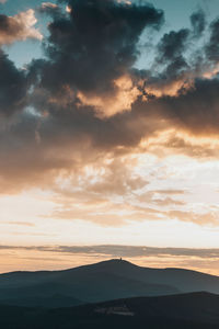 Scenic view of dramatic sky during sunset