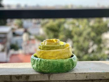 Close-up of colourful pottery on table