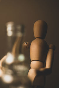Close-up of figurine on table