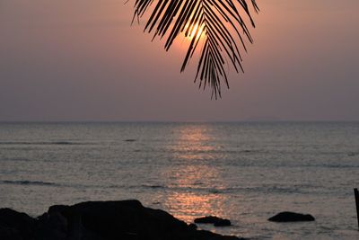 Scenic view of sea at sunset