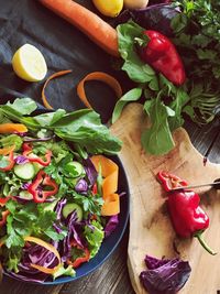 High angle view of chopped vegetables on cutting board