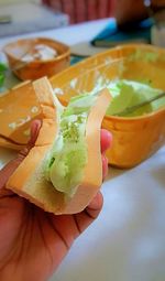 Close-up of hand holding bread