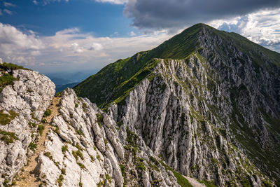 Panoramic view of rocky mountains against sky