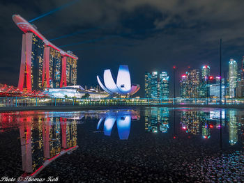 Illuminated modern building in city at night