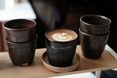 Close-up of coffee cup on table