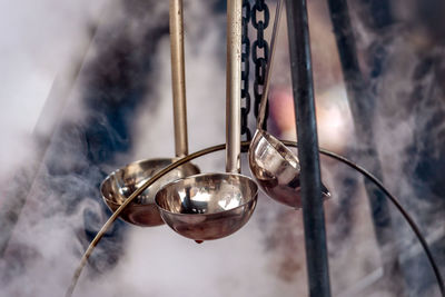 Close up of ladle hanging