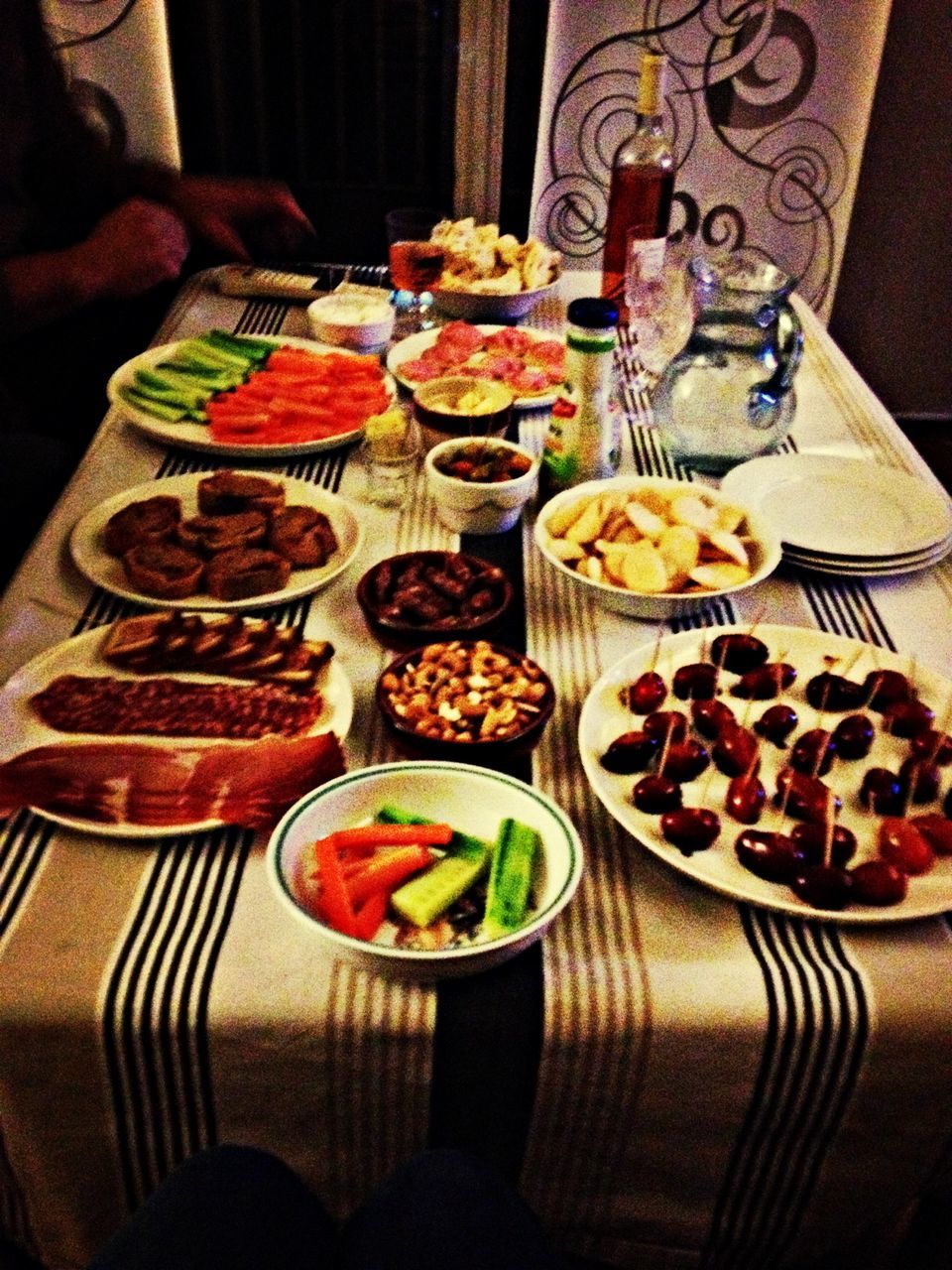 indoors, table, food and drink, freshness, food, still life, plate, high angle view, ready-to-eat, tablecloth, indulgence, bowl, decoration, healthy eating, variation, no people, drinking glass, home interior, drink, arrangement