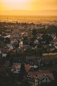 High angle view of townscape against sky during sunset