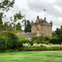 Castle against cloudy sky