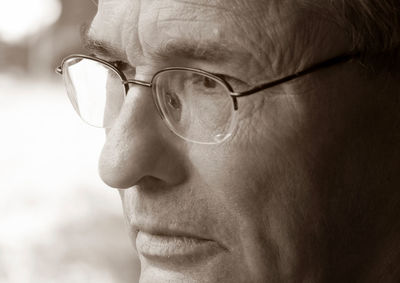 Close-up of man wearing eyeglasses