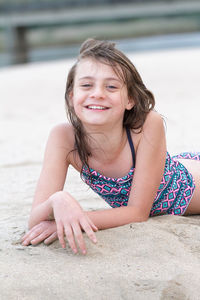 Portrait of a smiling girl on beach