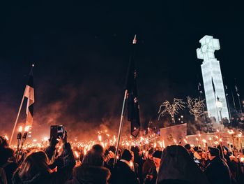 People photographing at night