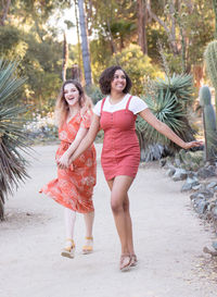 Full length portrait of happy woman