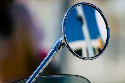 Close-up of motorcycle mirror