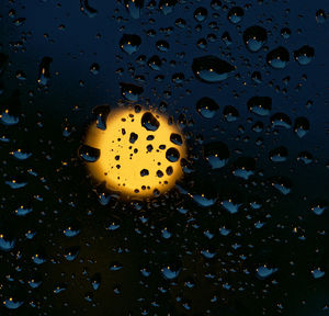 Close-up of waterdrops on wet glass